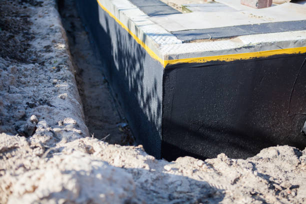Professional Waterproofing technician working in Appleton, NY
